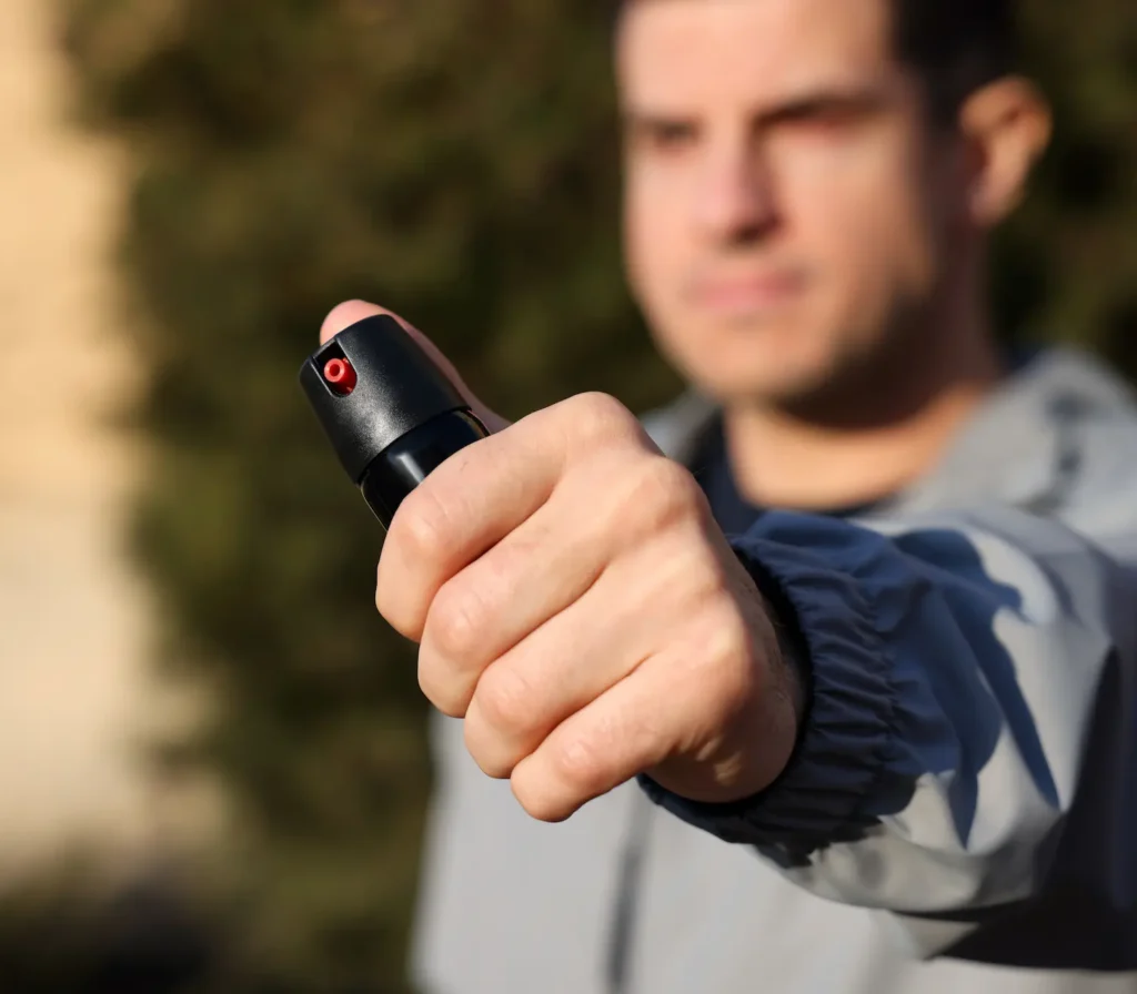 Defence marker spray