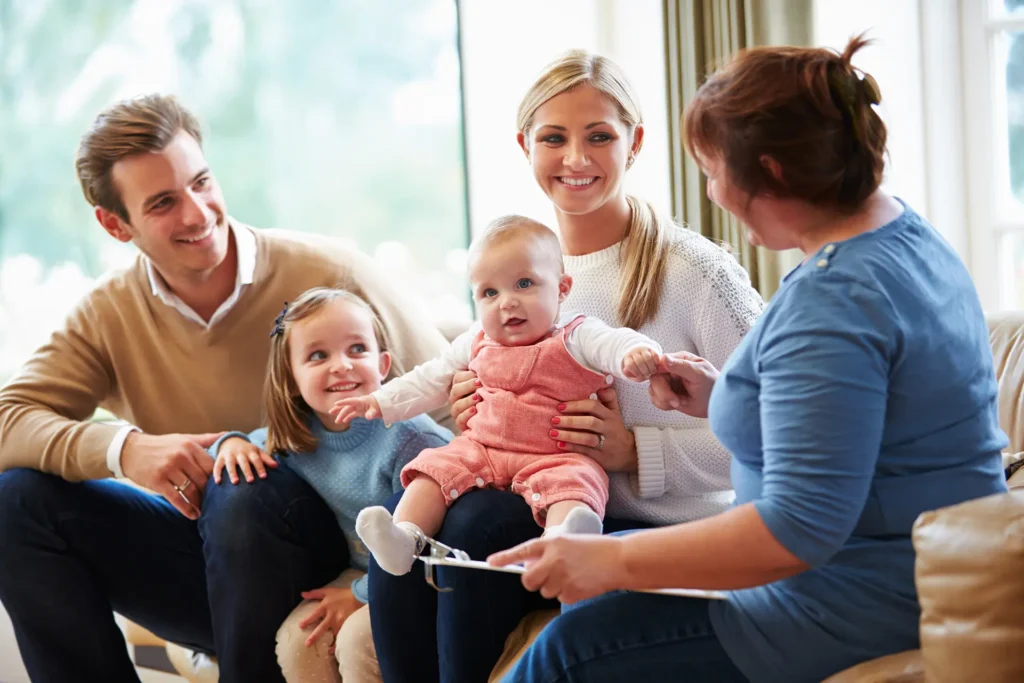 Social worker with a family group