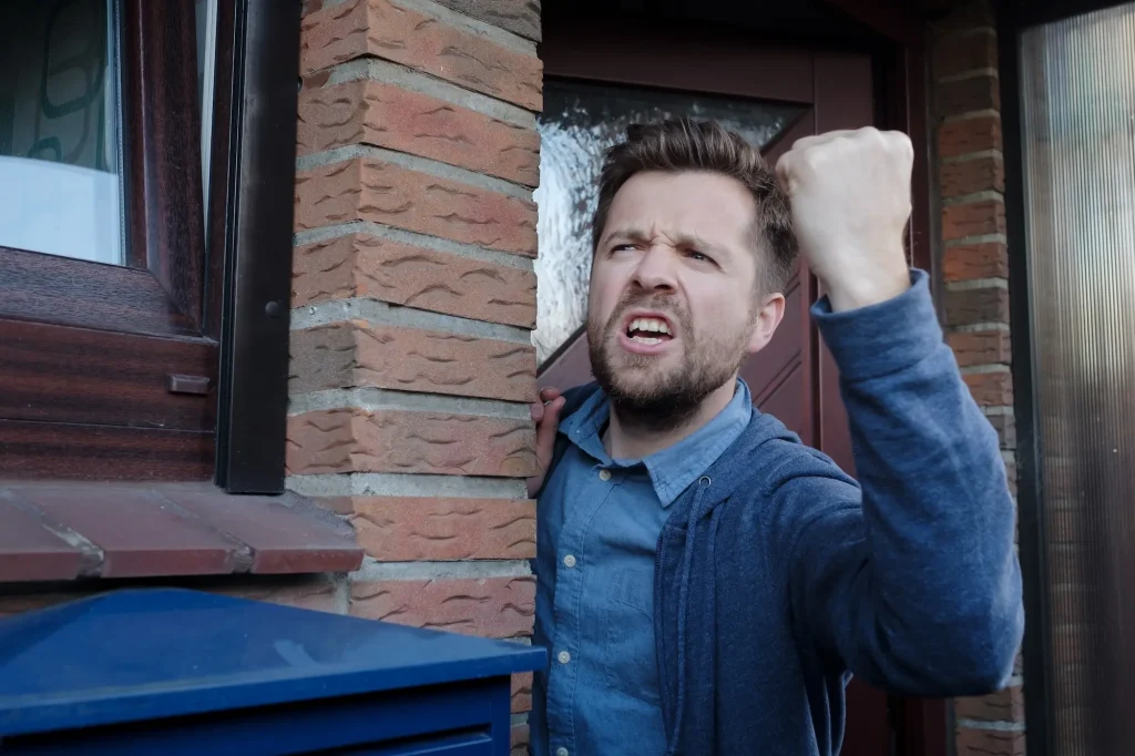 An anti social tenant threatens his neighbour
