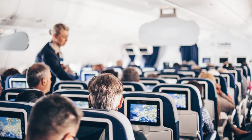 An air stewardess working on a plane