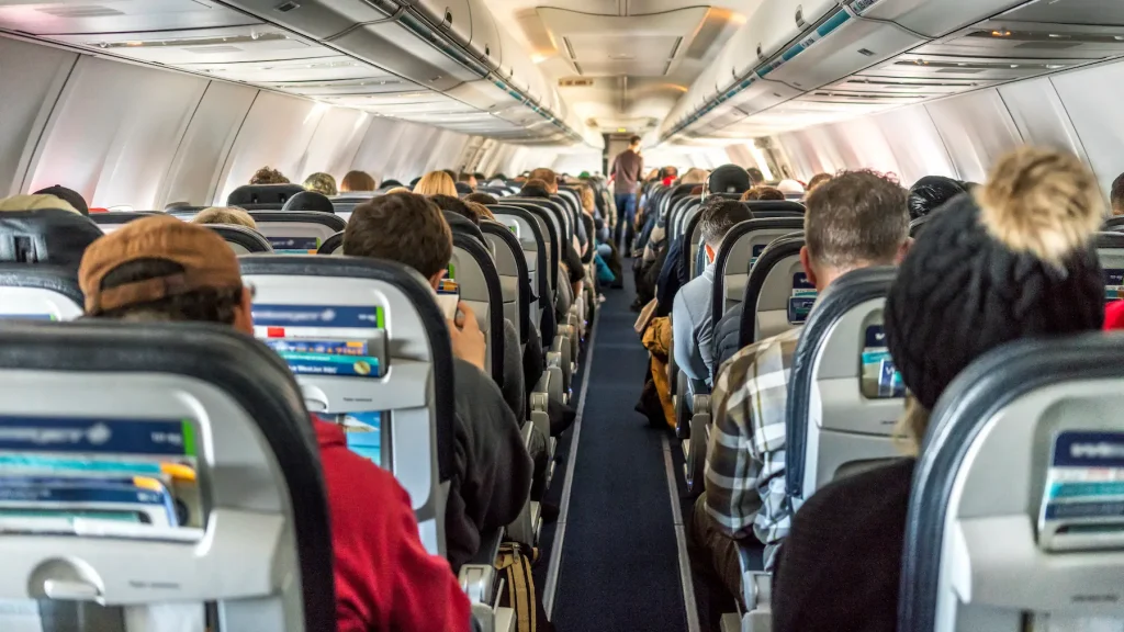 A photo of passengers on an aircraft
